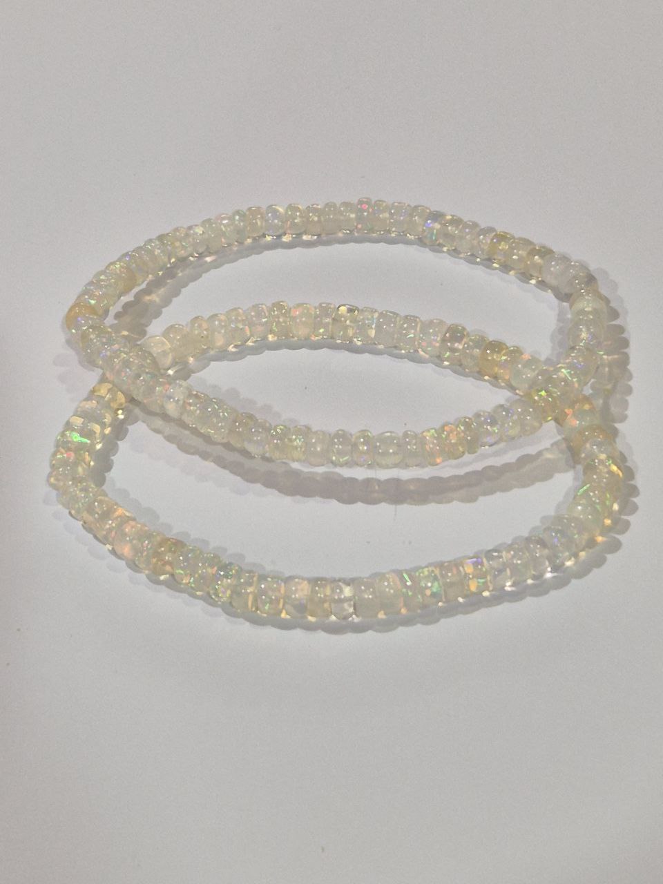 Ethiopian Welo Opal rondelle beads (white) (price per piece)