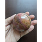 rhodonite sphere for love and emotional balance