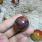 sardonyx palm stone and mini sphere