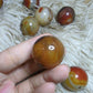 sardonyx palm stone and mini sphere