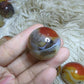 sardonyx palm stone and mini sphere