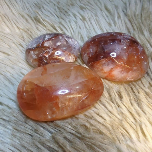 fire quartz palm stone