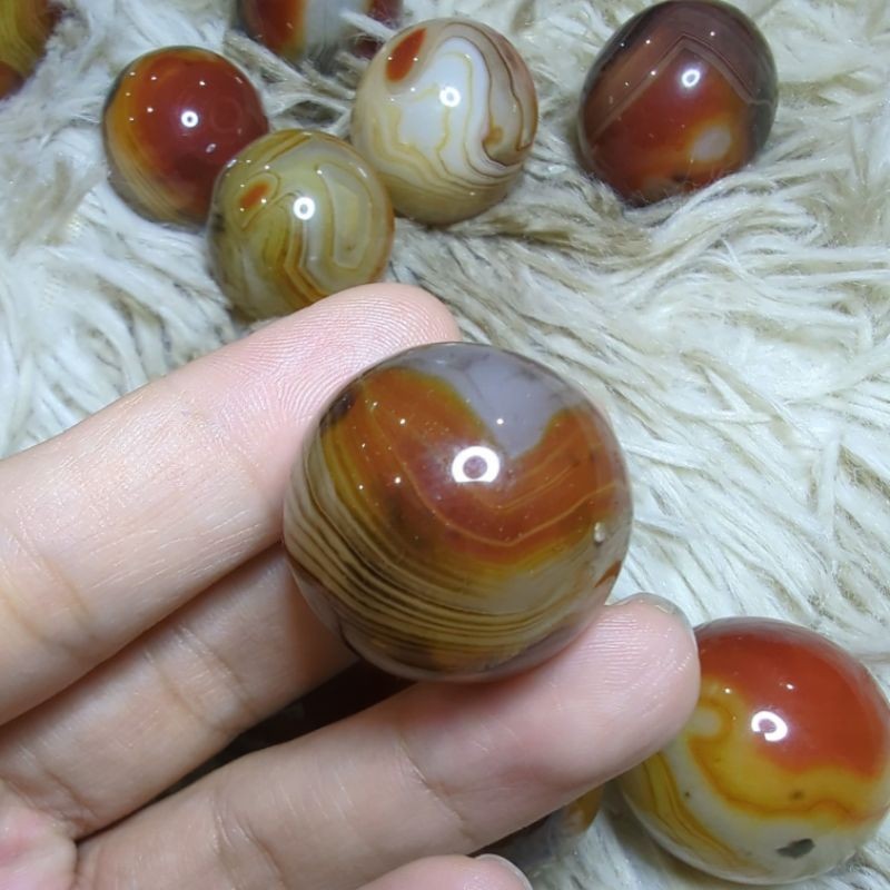 sardonyx palm stone and mini sphere