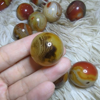 sardonyx palm stone and mini sphere