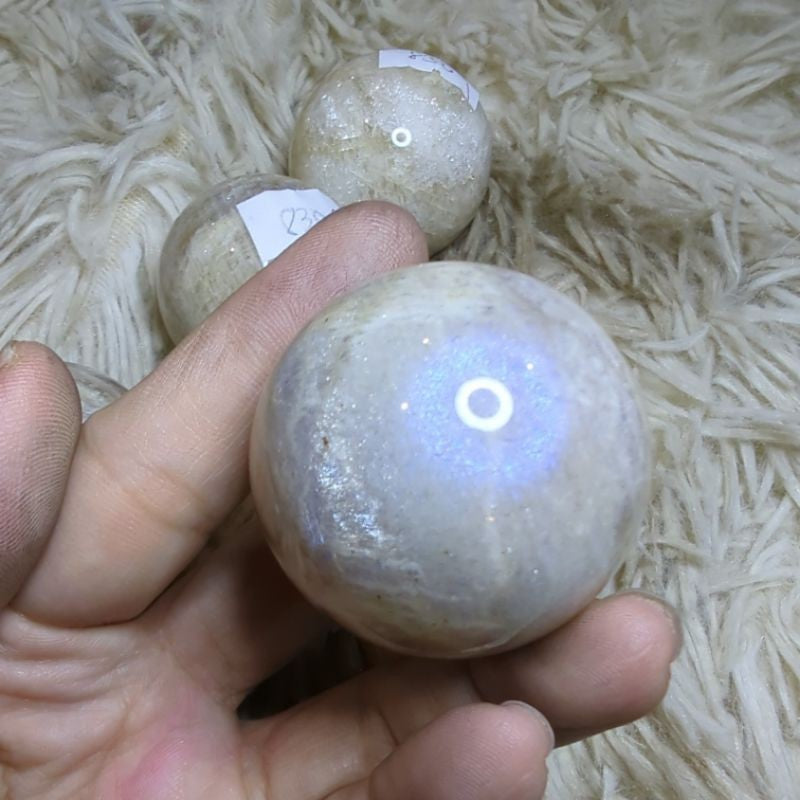 white moonstone sphere for protection and empowerment