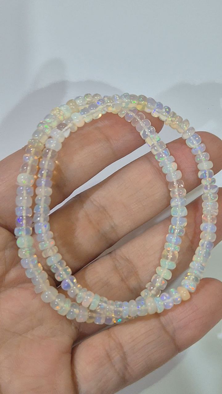 Ethiopian Welo Opal rondelle beads (white) (price per piece)