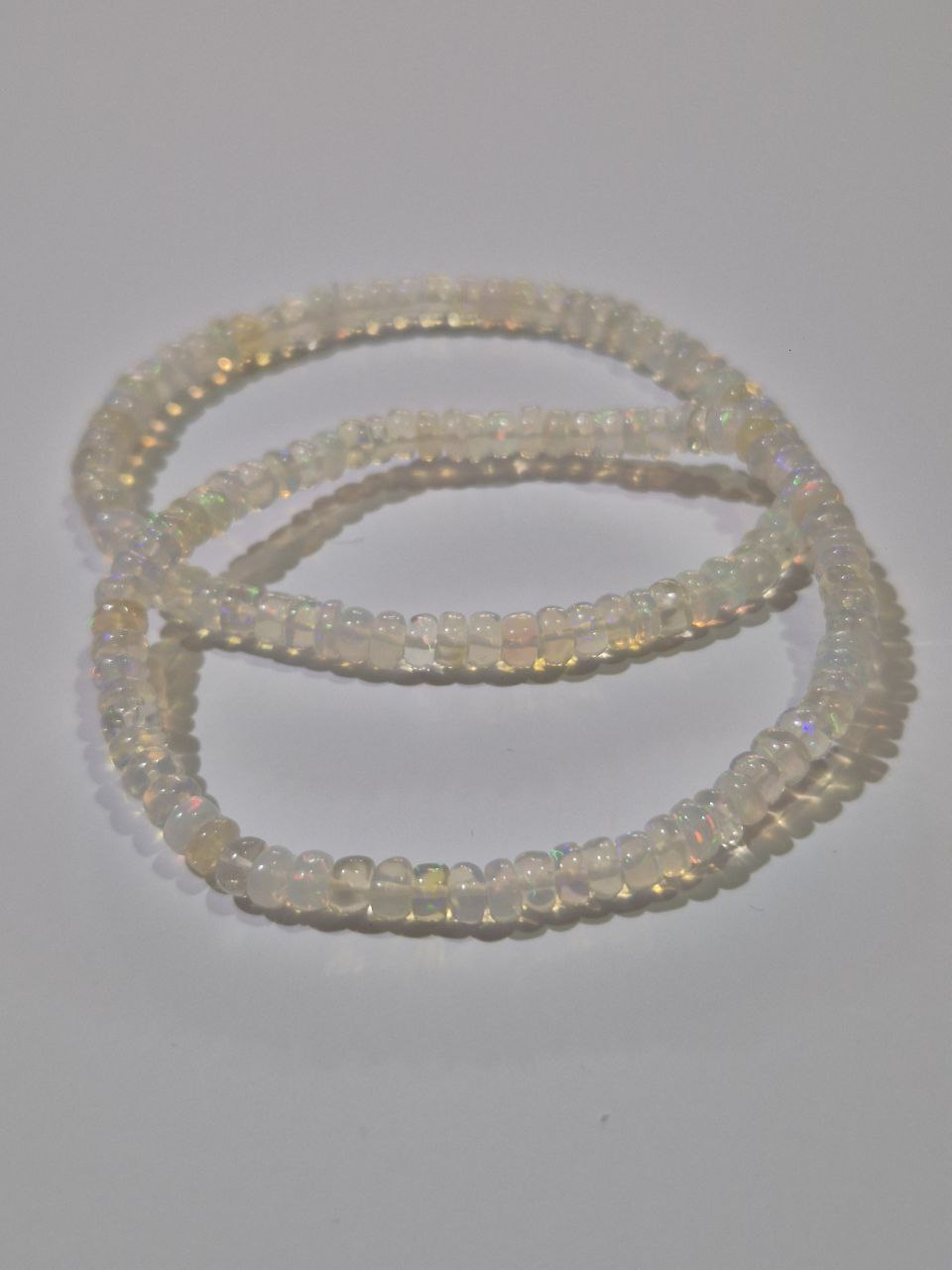 Ethiopian Welo Opal rondelle beads (white) (price per piece)